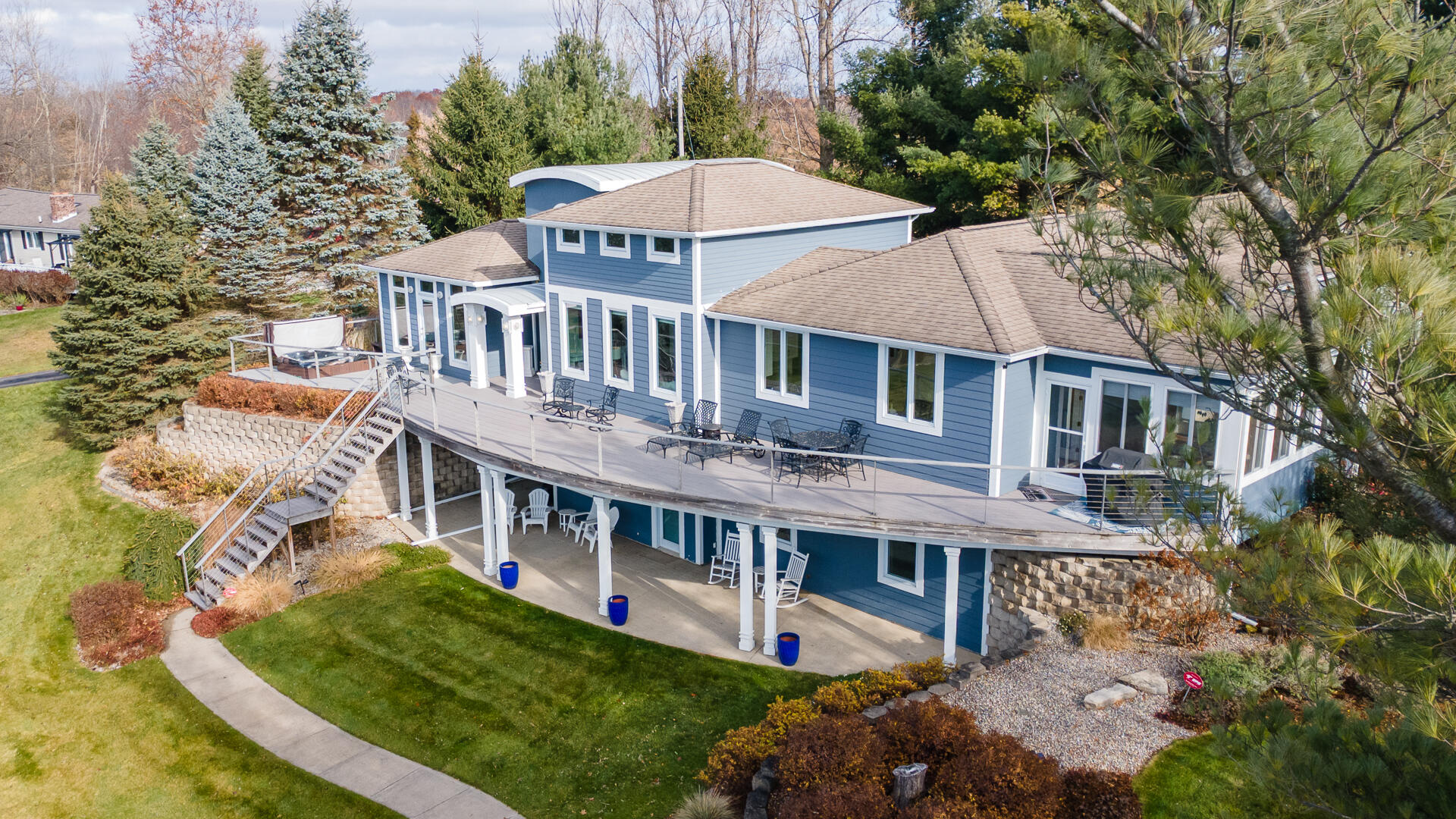 11864 5 Mile Road Northeast Lowell, MI 49331 - Photo 37 of 59 Amazing Deck and Covered Patio