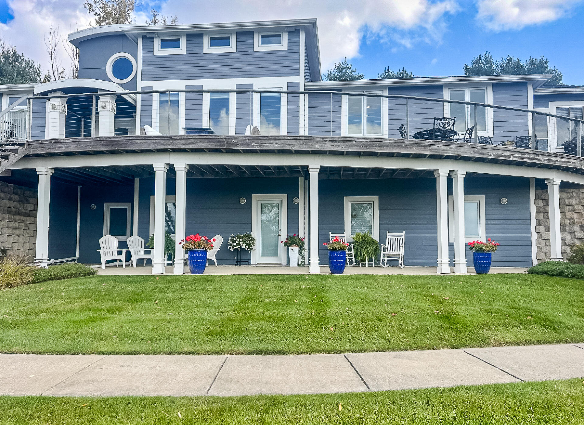 11864 5 Mile Road Northeast Lowell, MI 49331 - Photo 49 of 59 MC PORCH FLOWERS-
