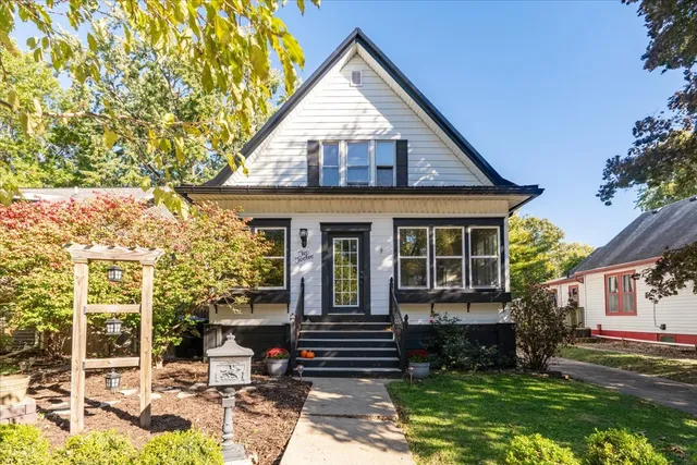 front view of a house with a yard