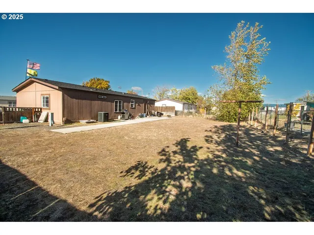 a view of ocean with large building