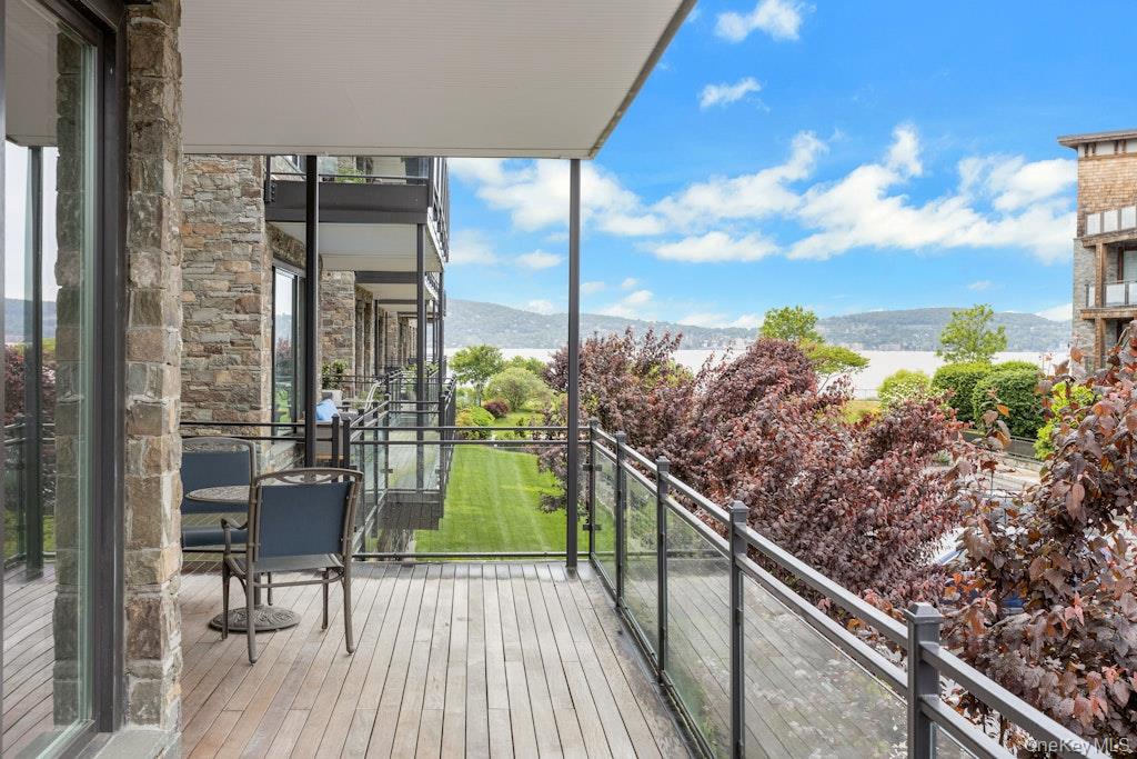 18 Rivers Edge Drive, Unit 211 Tarrytown, NY 10591 - Photo 3 of 30 a balcony with an outdoor space