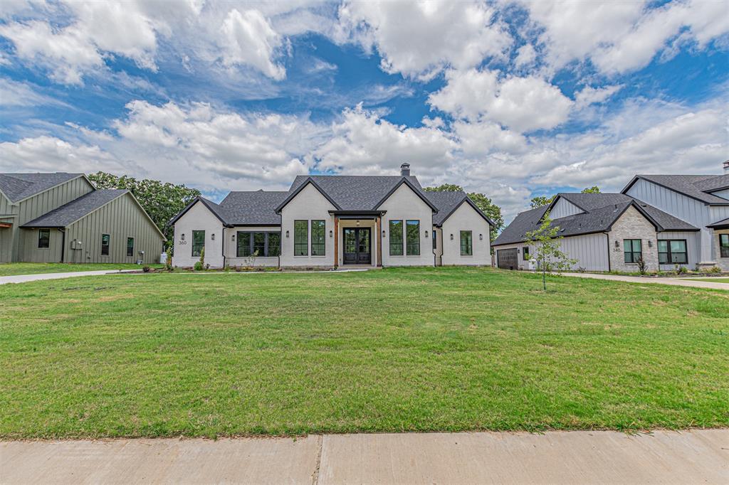 360 Dalton Road Canton, TX 75103 - Photo 33 of 33 Modern farmhouse-style residence featuring a prominent black roof and light-colored exterior