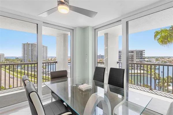 a view of a dining room with furniture window and outside view