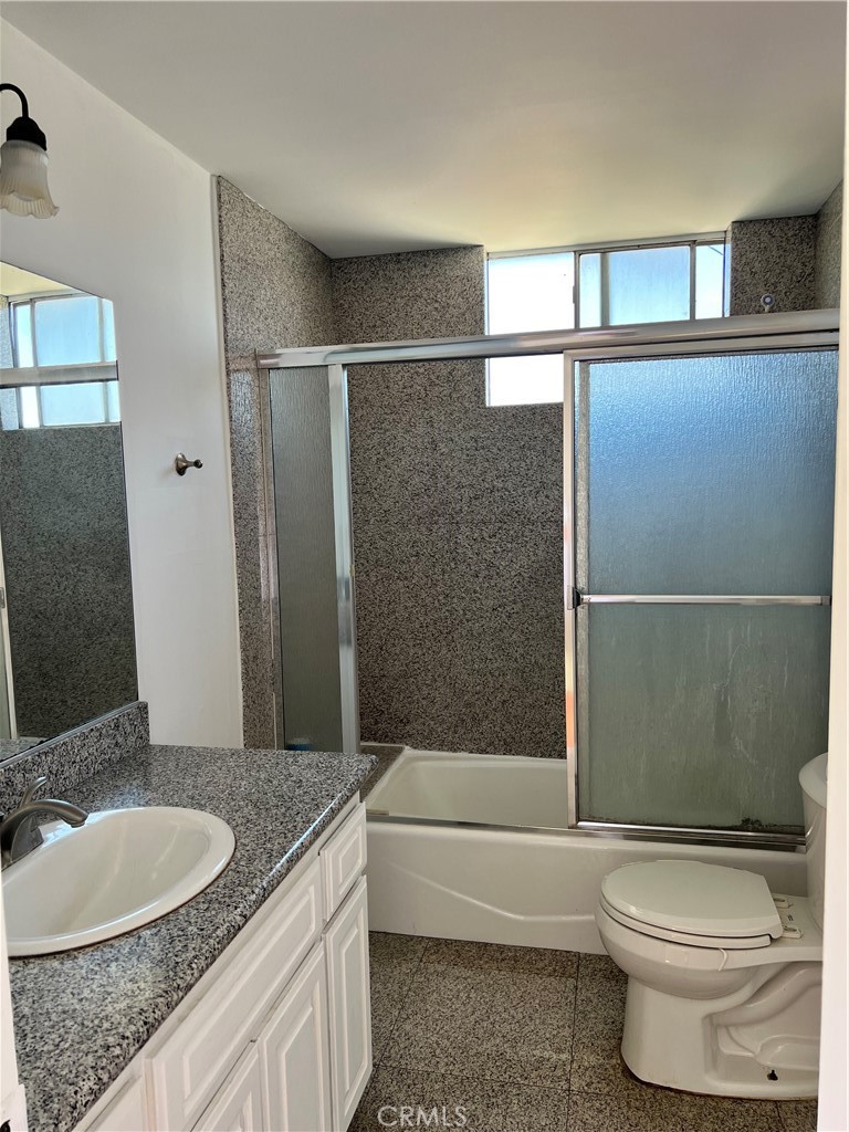 4731 Helmgate Drive El Monte, CA 91732 - Photo 18 of 30 a bathroom with a granite countertop sink toilet and shower