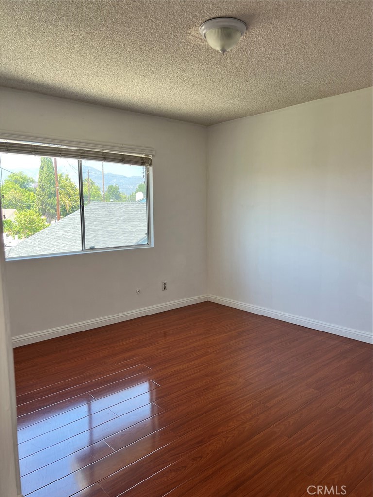4731 Helmgate Drive El Monte, CA 91732 - Photo 19 of 30 a view of a room with wooden floor and window