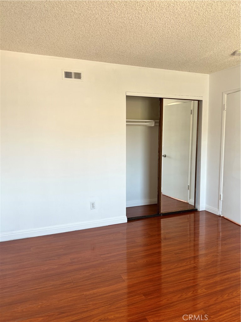 4731 Helmgate Drive El Monte, CA 91732 - Photo 20 of 30 a view of an empty room with wooden floor