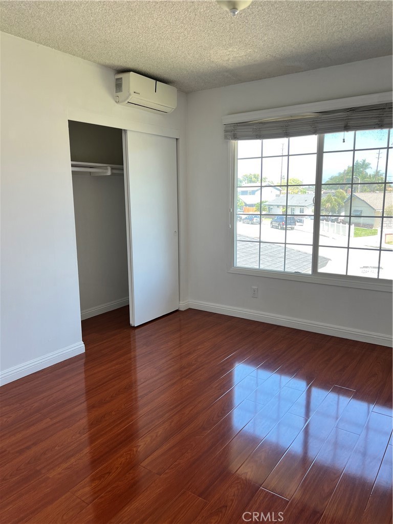 4731 Helmgate Drive El Monte, CA 91732 - Photo 21 of 30 a view of an empty room with wooden floor and a window