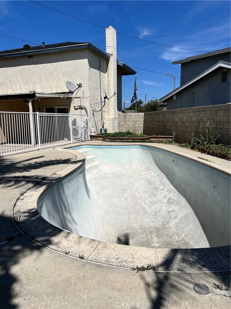 4731 Helmgate Drive El Monte, CA 91732 - Photo 27 of 30 a view of a swimming pool and window