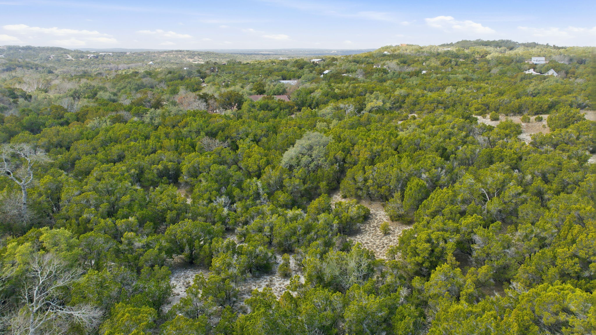 400 Sundown Ridge Austin, TX 78737 - Photo 15 of 21 View of property location with a heavily wooded area