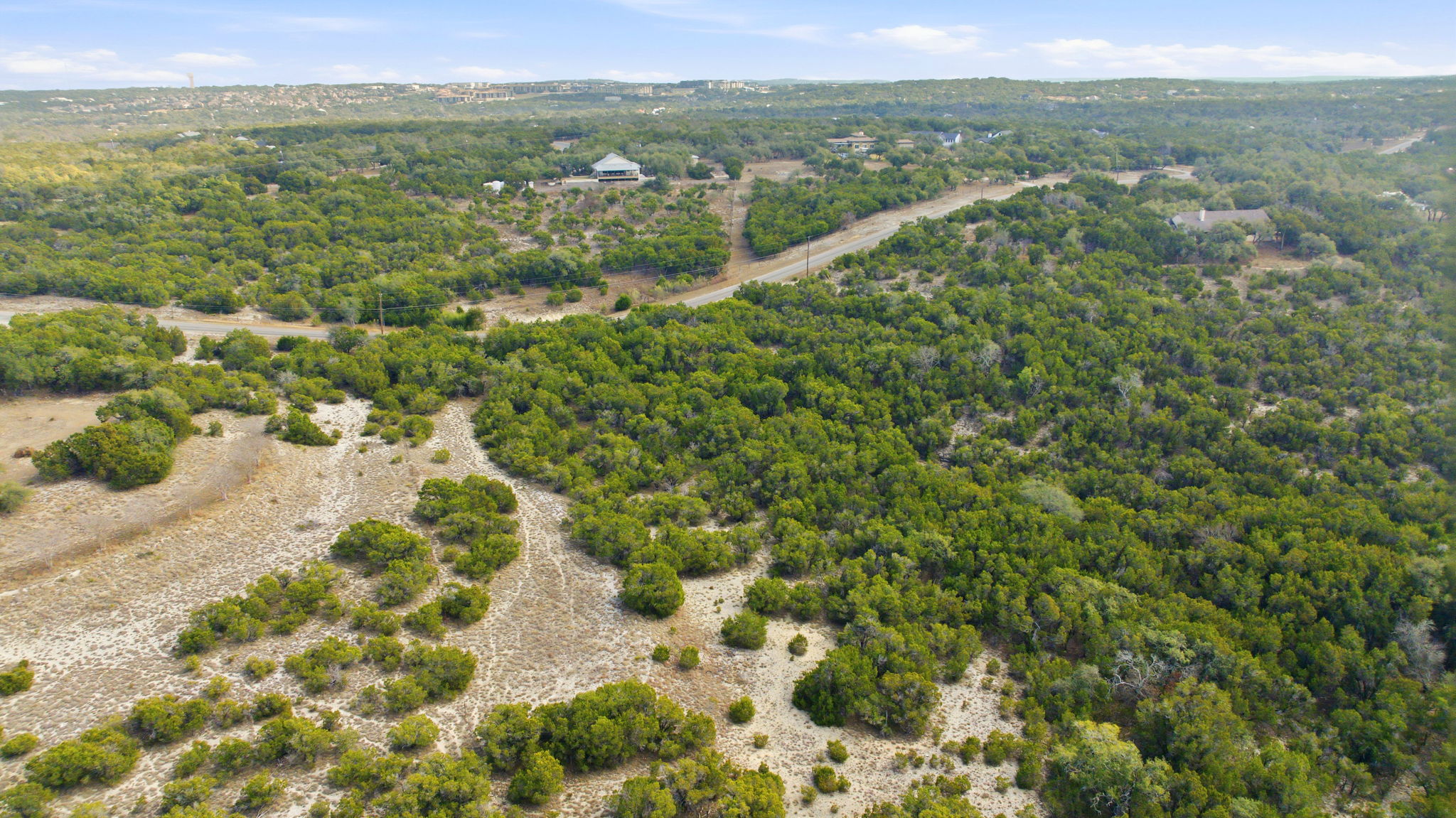 400 Sundown Ridge Austin, TX 78737 - Photo 16 of 21 View of property location with a forest