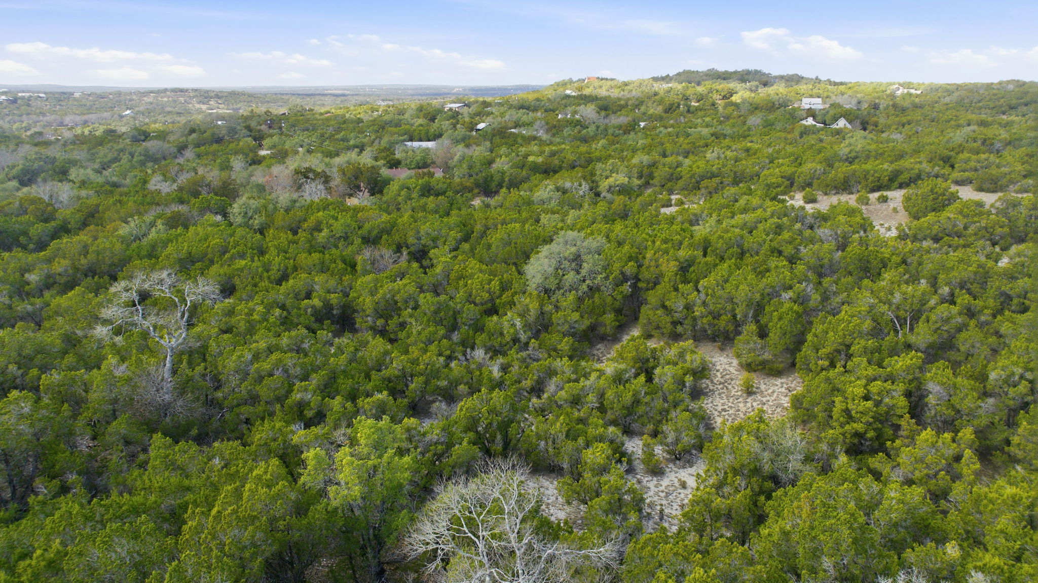 400 Sundown Ridge Austin, TX 78737 - Photo 17 of 21 View of property location with a forest