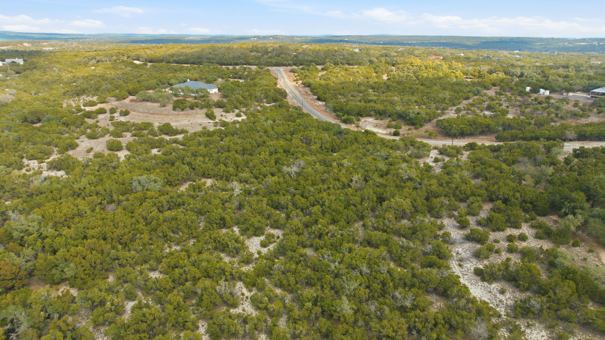 400 Sundown Ridge Austin, TX 78737 - Photo 18 of 21 Aerial view of property's location featuring a forest