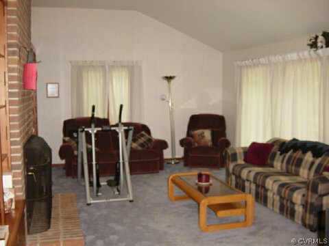 3914 Timber Ridge Road Midlothian, VA 23112 - Photo 3 of 10 a living room with furniture a couch and a window