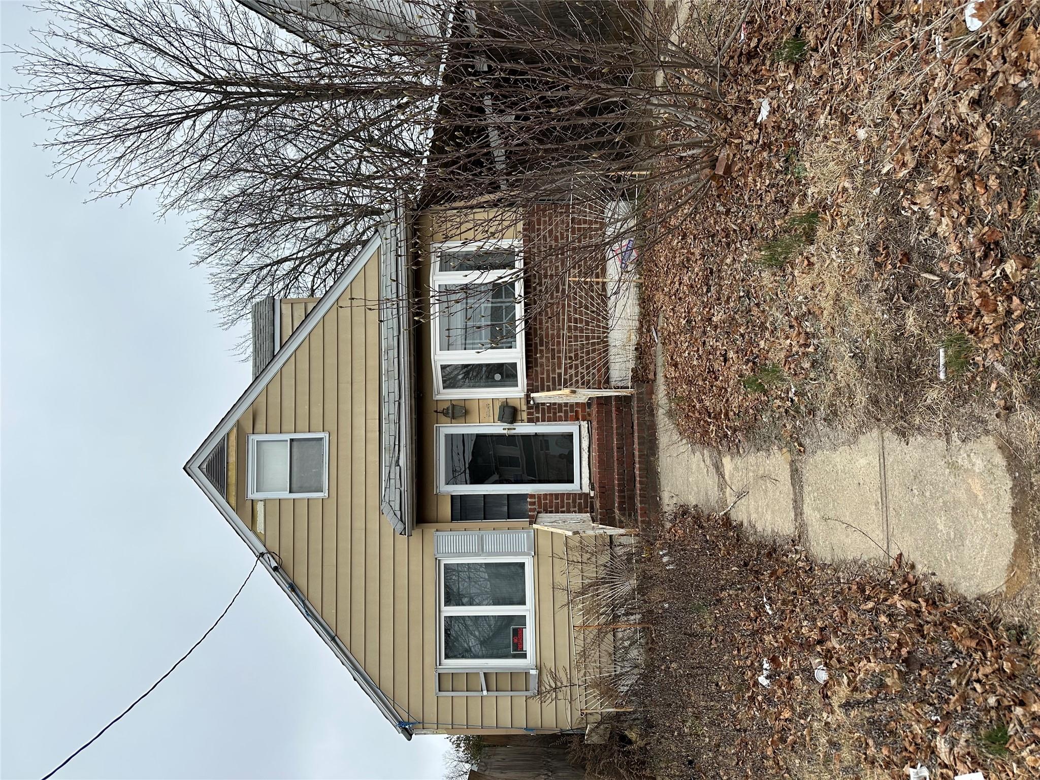 136-08 Hook Creek Boulevard Queens, NY 11422 - Photo 1 of 1 Bungalow-style home with entry steps and brick siding