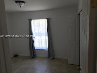 15280 Northeast 34th Terrace Citra, FL 32113 - Photo 20 of 37 an empty room with a window