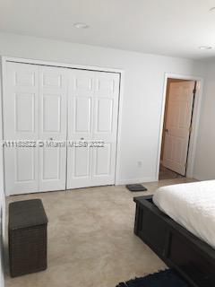 15280 Northeast 34th Terrace Citra, FL 32113 - Photo 35 of 37 a living room with a bed and furniture
