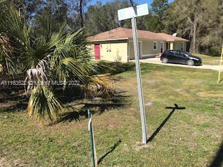 15280 Northeast 34th Terrace Citra, FL 32113 - Photo 36 of 37 a view of a house with backyard