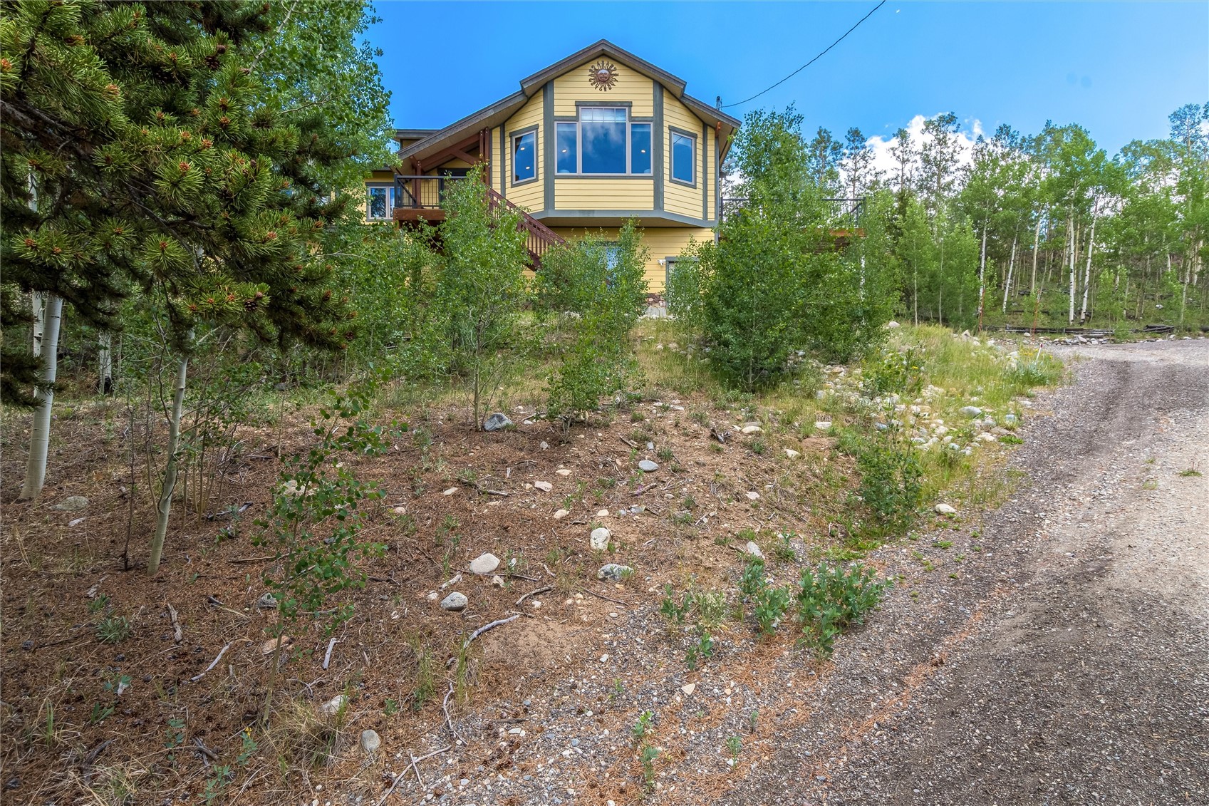 592 Ponderosa Road Fairplay, CO 80440 - Photo 40 of 45 a front view of a house with a yard