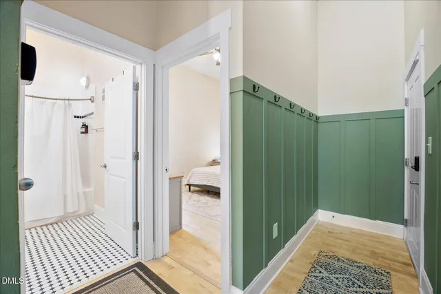 a view of a bathroom from a hallway