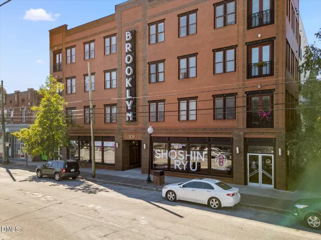 a car parked in front of a building