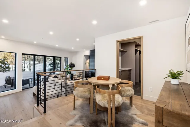 a kitchen with a sink and a refrigerator