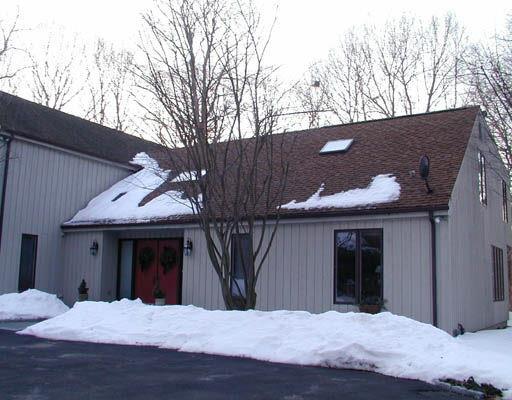 119 Golf Lane Ridgefield, CT 06877 - Photo 1 of 1 a view of a house with a yard and garage
