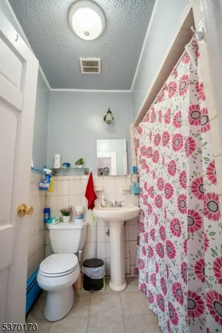 $629,900 | 74 4th Street, Elizabeth Port, NJ 07206