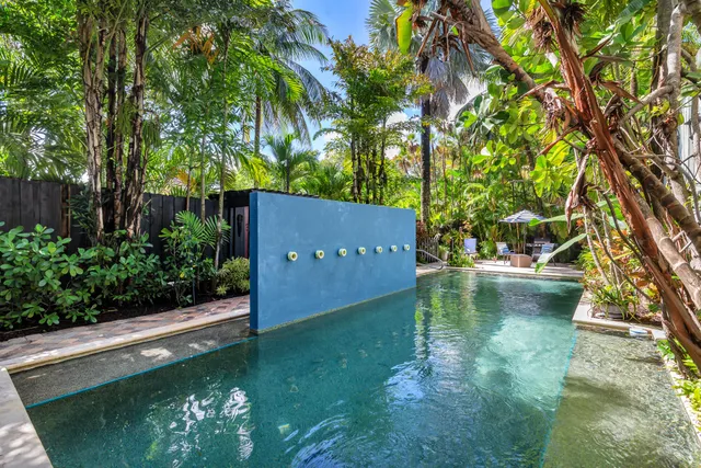 a view of a back yard with green space