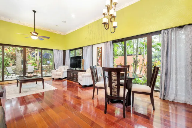 a kitchen with stainless steel appliances granite countertop a sink and cabinets