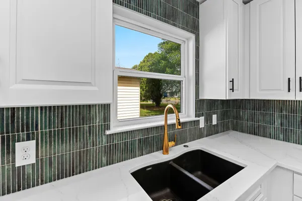 a view of a kitchen from a window