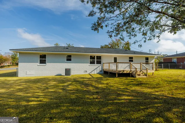 a front view of residential houses with swimming pool