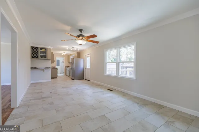 a view of a kitchen with a sink and a window