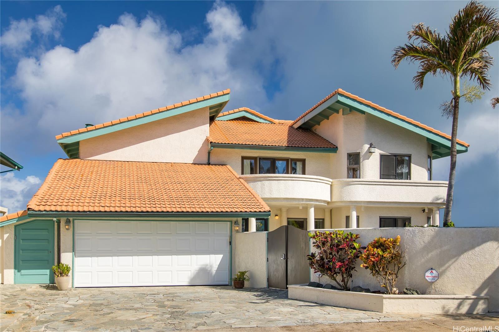 a front view of a house with a garage