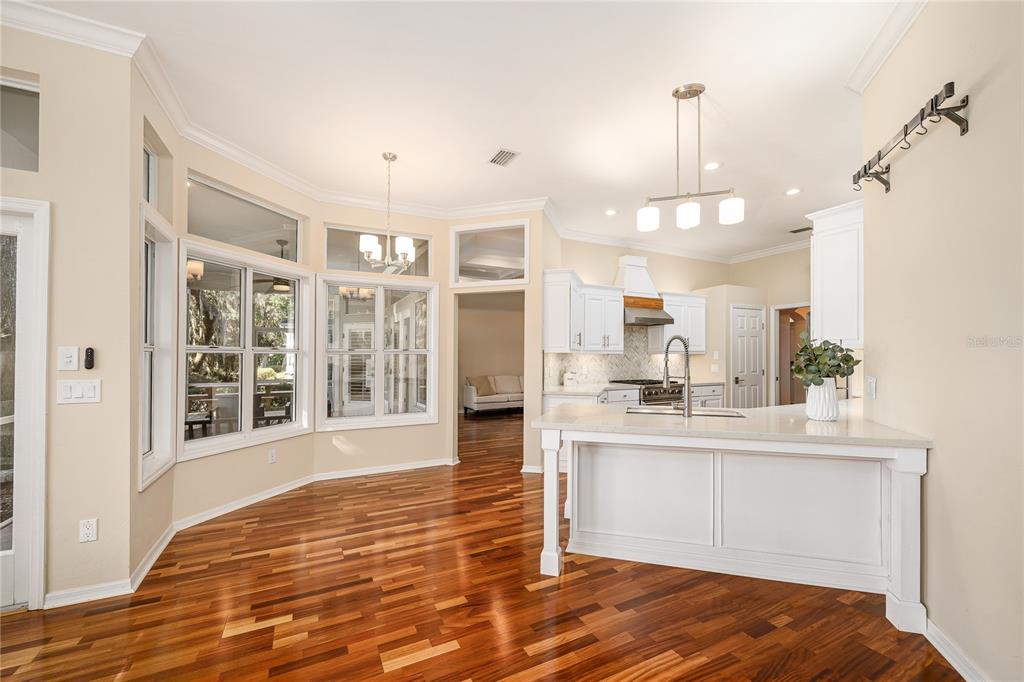 4417 Southwest 91st Drive Gainesville, FL 32608 - Photo 15 of 54 a view of a kitchen and kitchen island