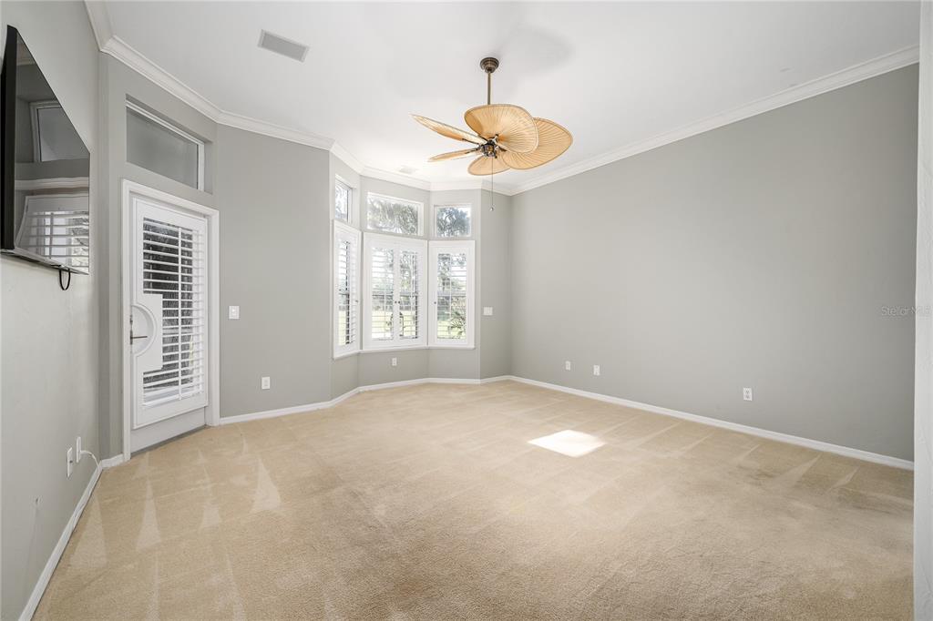 4417 Southwest 91st Drive Gainesville, FL 32608 - Photo 20 of 54 a view of an empty room with a window