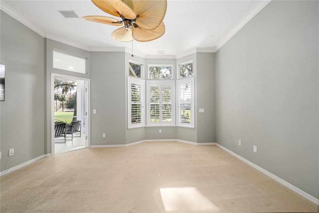 4417 Southwest 91st Drive Gainesville, FL 32608 - Photo 22 of 54 a view of an empty room with a window