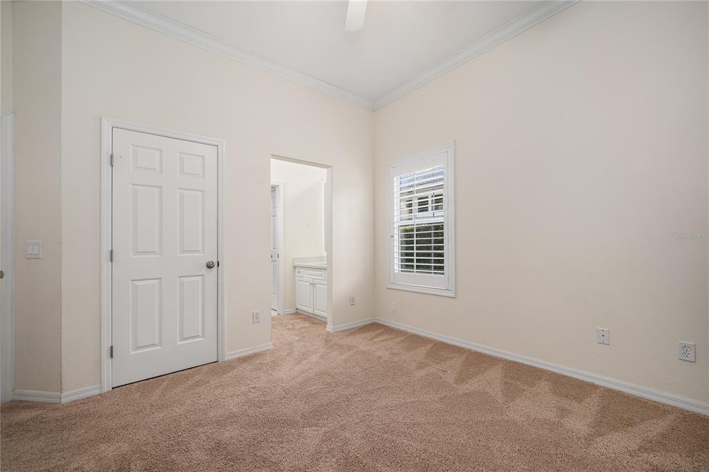 4417 Southwest 91st Drive Gainesville, FL 32608 - Photo 34 of 54 an empty room with windows