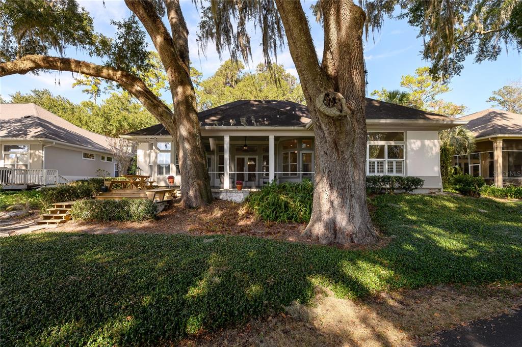 4417 Southwest 91st Drive Gainesville, FL 32608 - Photo 47 of 54 a view of a house with backyard and sitting area