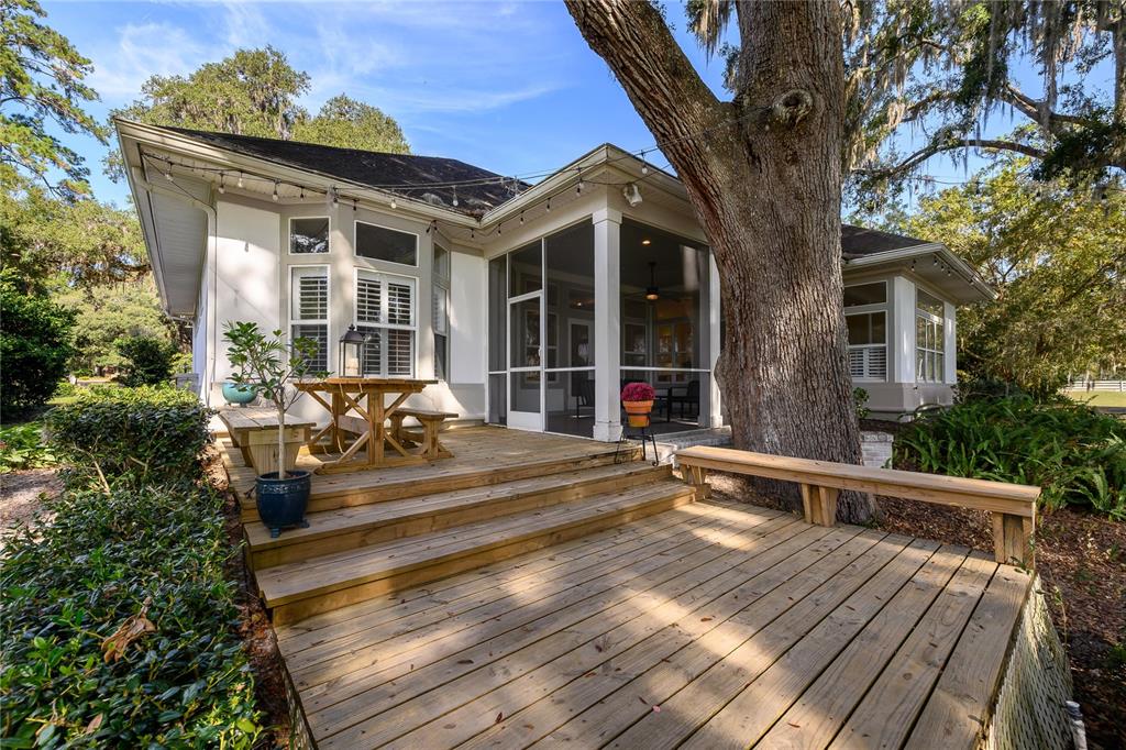 4417 Southwest 91st Drive Gainesville, FL 32608 - Photo 49 of 54 a view of a house with a patio