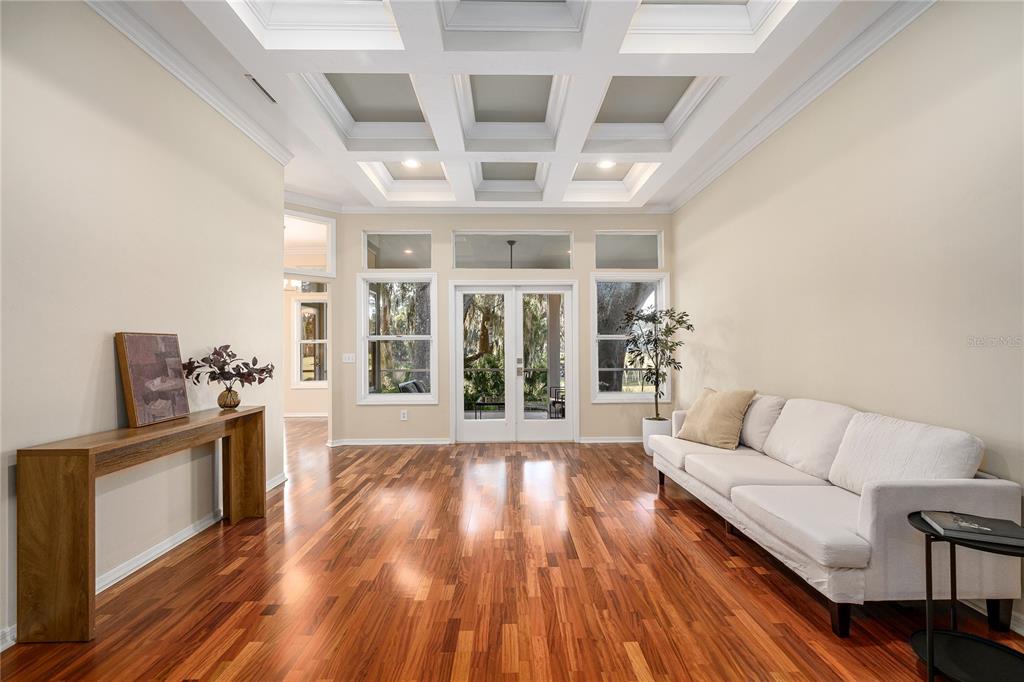 4417 Southwest 91st Drive Gainesville, FL 32608 - Photo 7 of 54 a living room with furniture and a fireplace