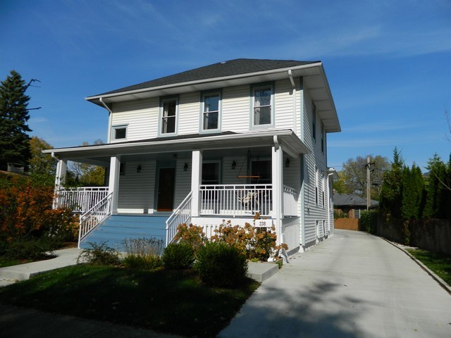 238 Lionel Road Riverside, IL 60546 - Photo 2 of 24 a front view of a house with a yard