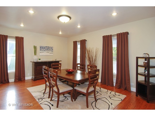 238 Lionel Road Riverside, IL 60546 - Photo 11 of 24 a view of a dining room with furniture and wooden floor