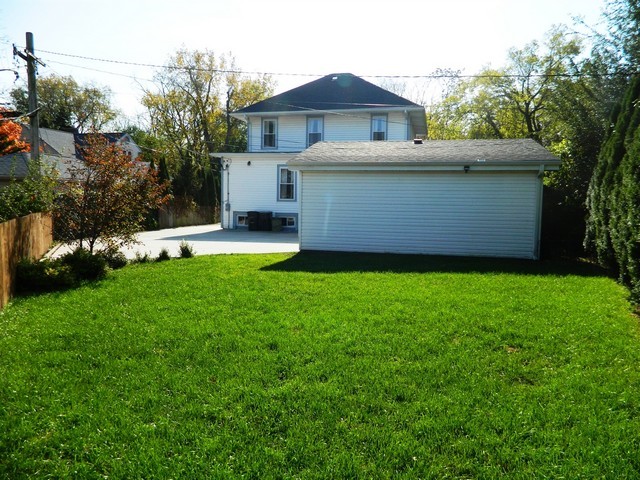 238 Lionel Road Riverside, IL 60546 - Photo 23 of 24 a view of a house with a yard