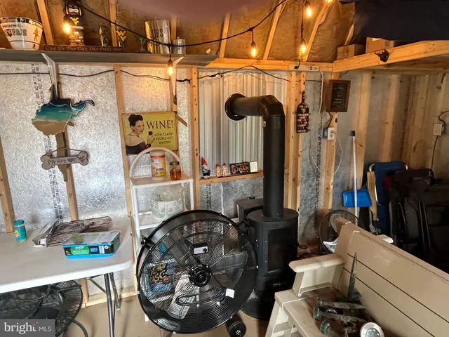 a outdoor living space with furniture and a fireplace