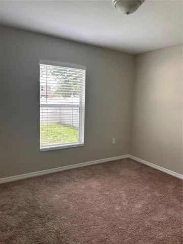 a view of empty room with stair