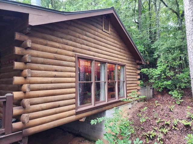 a backyard of a house with lots of green space