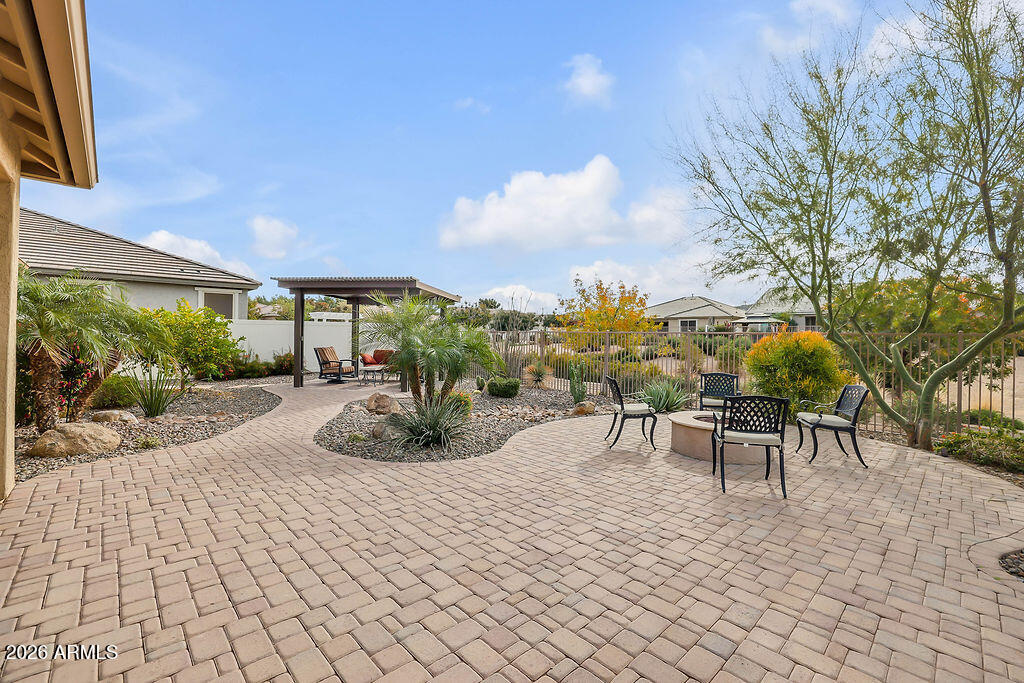 2523 East Nancy Lane Phoenix, AZ 85042 - Photo 29 of 48 a view of a patio with table and chairs and potted plants