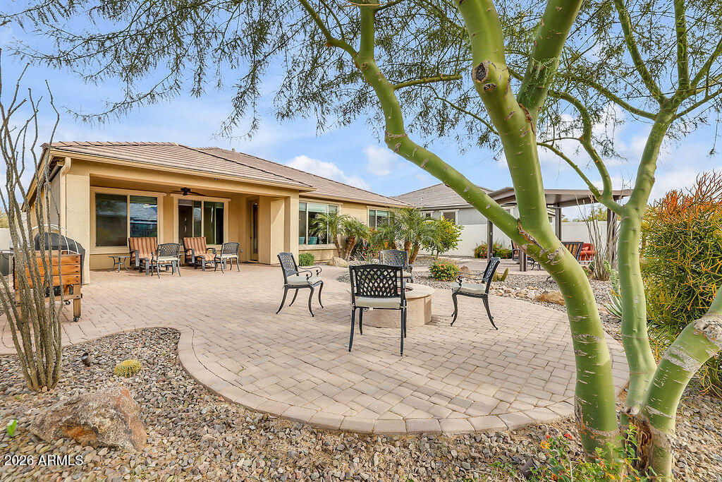 2523 East Nancy Lane Phoenix, AZ 85042 - Photo 33 of 48 a view of a swimming pool with a table and chairs