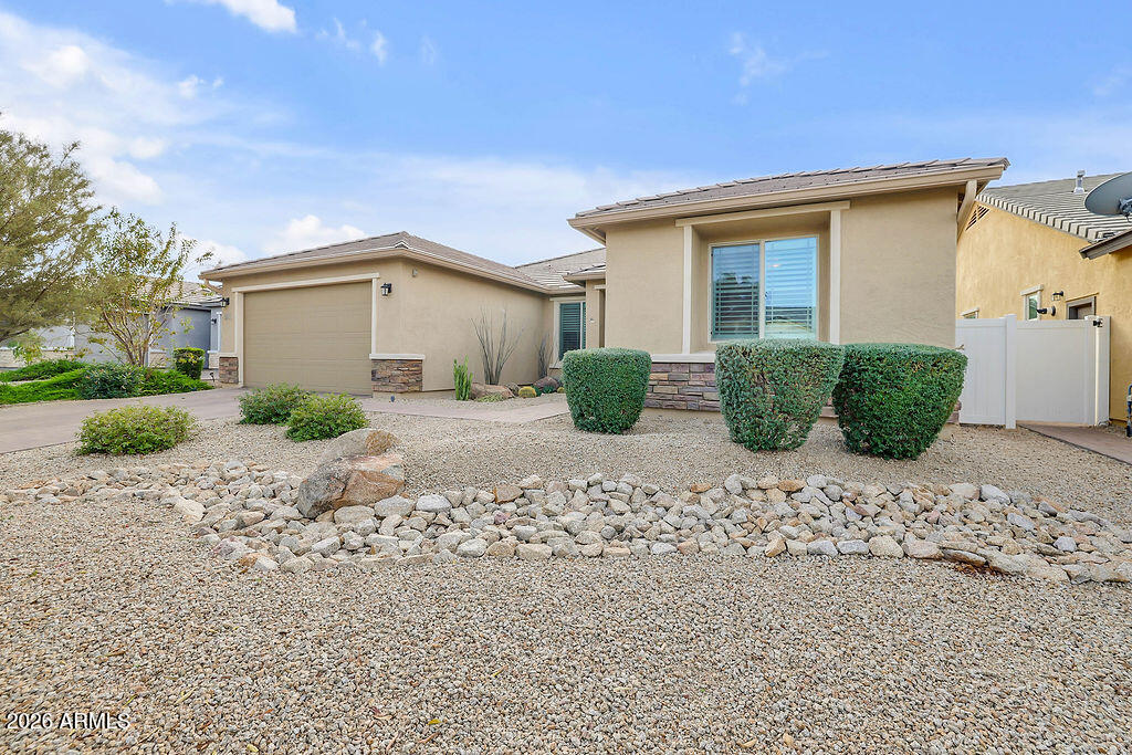 2523 East Nancy Lane Phoenix, AZ 85042 - Photo 48 of 48 a view of a house with a bunch of plants and trees