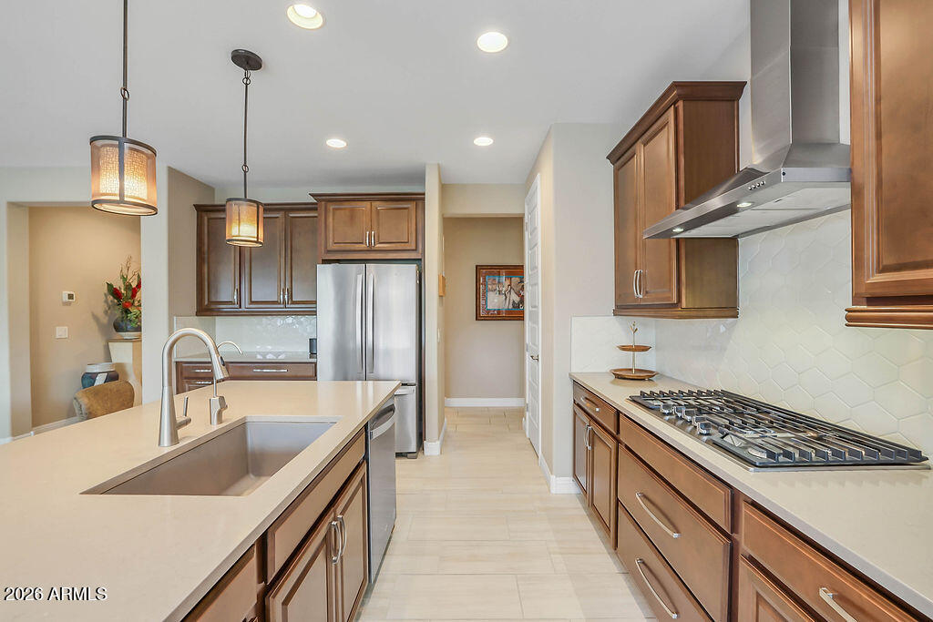 2523 East Nancy Lane Phoenix, AZ 85042 - Photo 10 of 48 a kitchen with stainless steel appliances granite countertop a sink stove and refrigerator